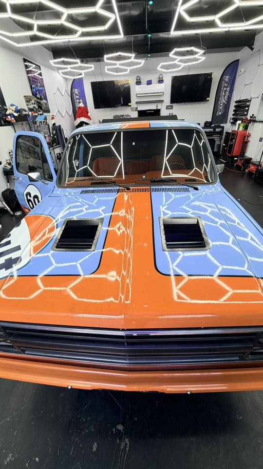 Custom truck display at sunset